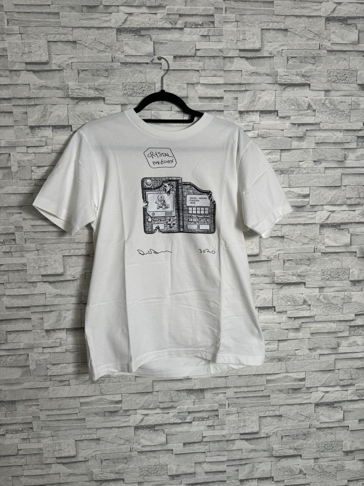 Daniel Arsham Daniel Arsham x Uniqlo Pokédex T-Shirt White M Size US M / EU 48-50 / 2 - 1 Thumbnail