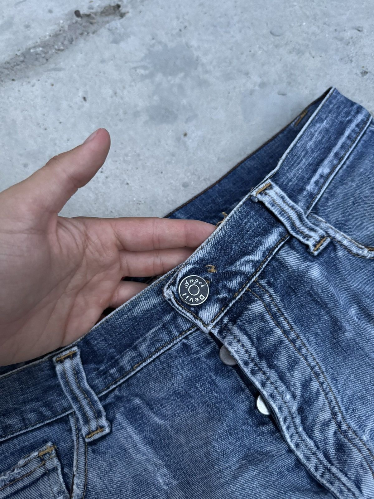VINTAGE DISTRESSED WINGS DENIM JEANS