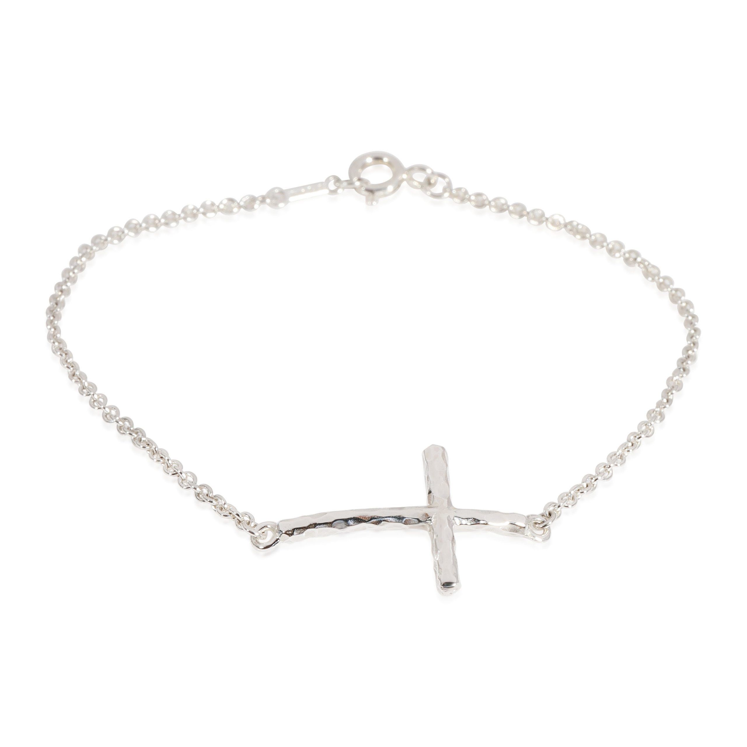 image of Tiffany Co Tiffany & Co. Paloma Picasso Hammered Cross Bracelet In Sterling Silver, Women's