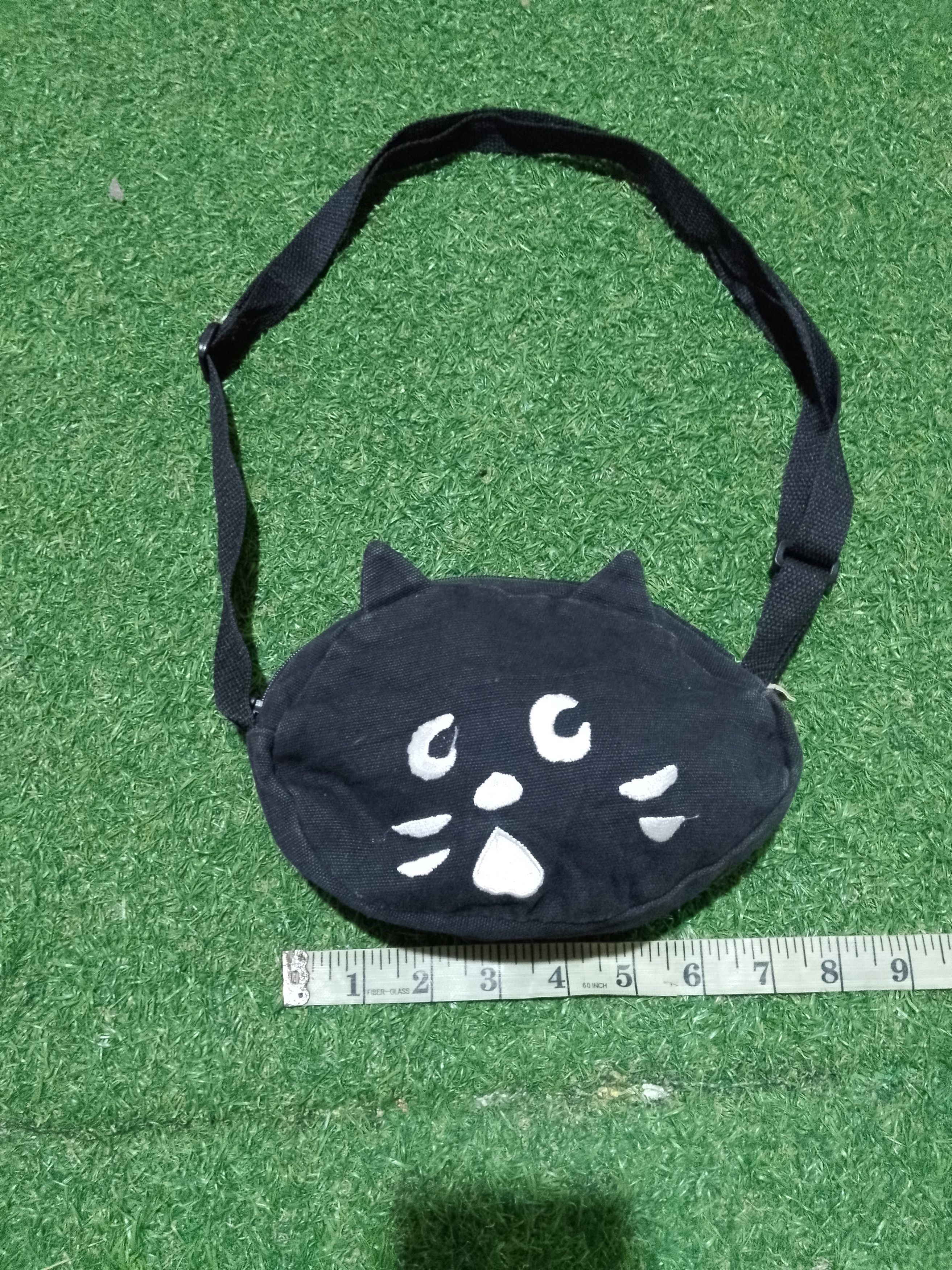 Issey Miyake × Ne-Net × Vintage Ne-Net by Issey Miyake big cat mini bag Size ONE SIZE - 1 Thumbnail