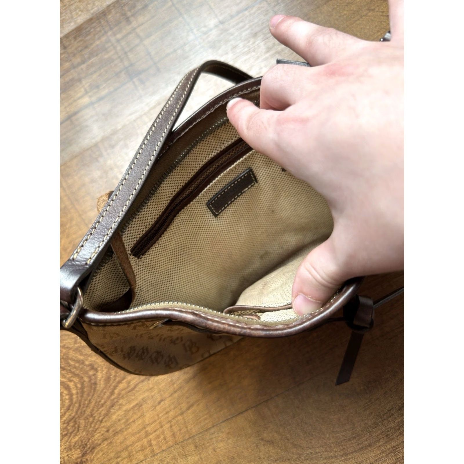 Dooney & Bourke Dooney & Bourke handbag signature canvas with leather strap Baguette Style Bag Width 11" Brown Canvas Zip 6.5" Height Small Size ONE SIZE - 6 Thumbnail