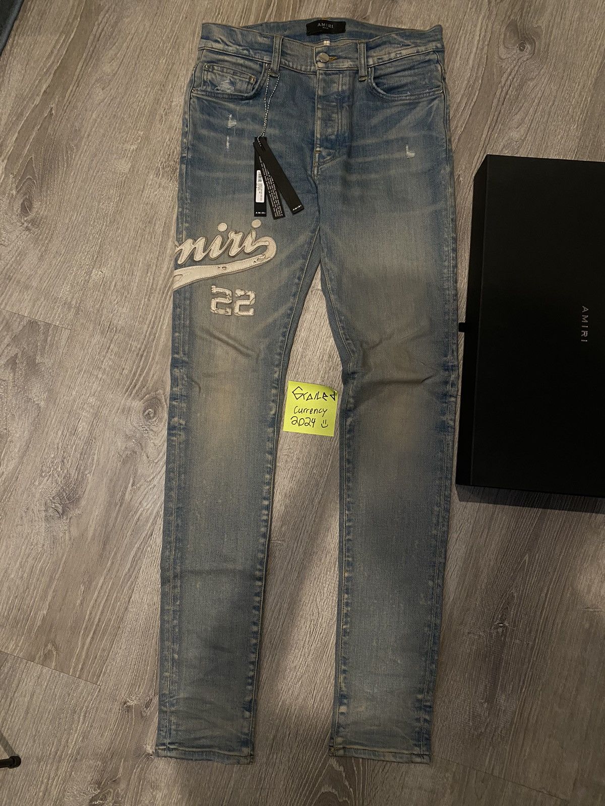 Amiri Varsity appliqué Jeans Denim