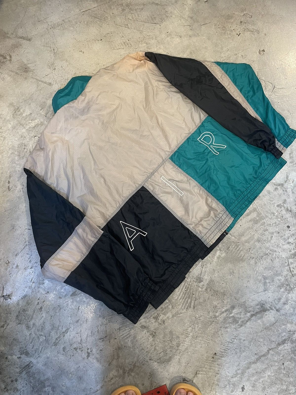 image of Nike Air Spell Out Windbreaker Jacket in Blue, Men's (Size XL)
