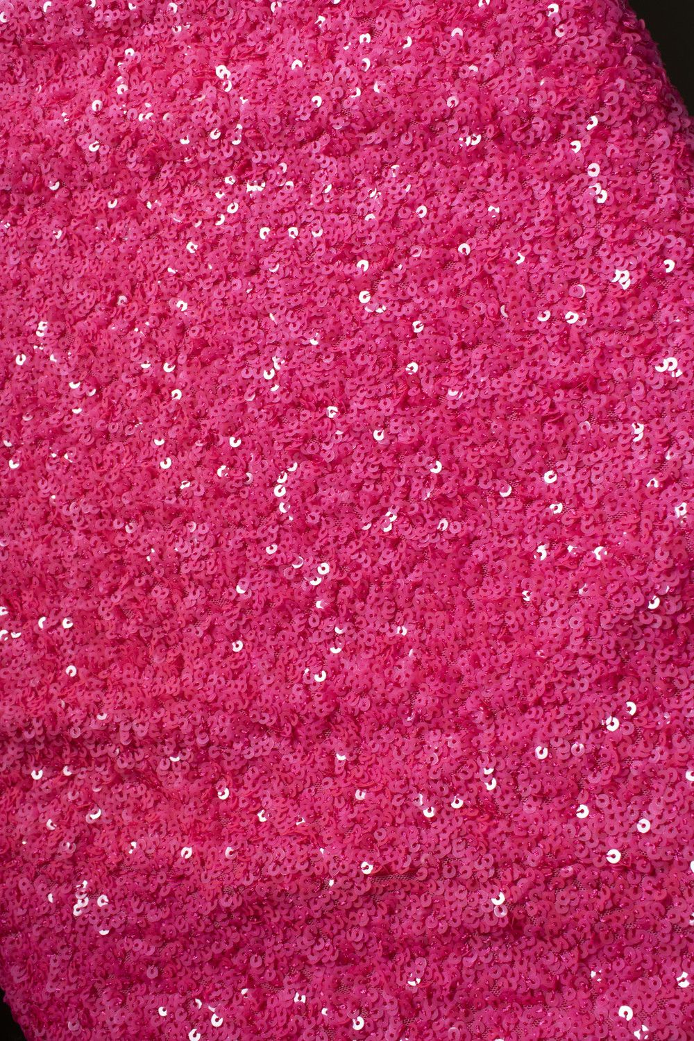 Rotate, pink sequinned skirt with back slit