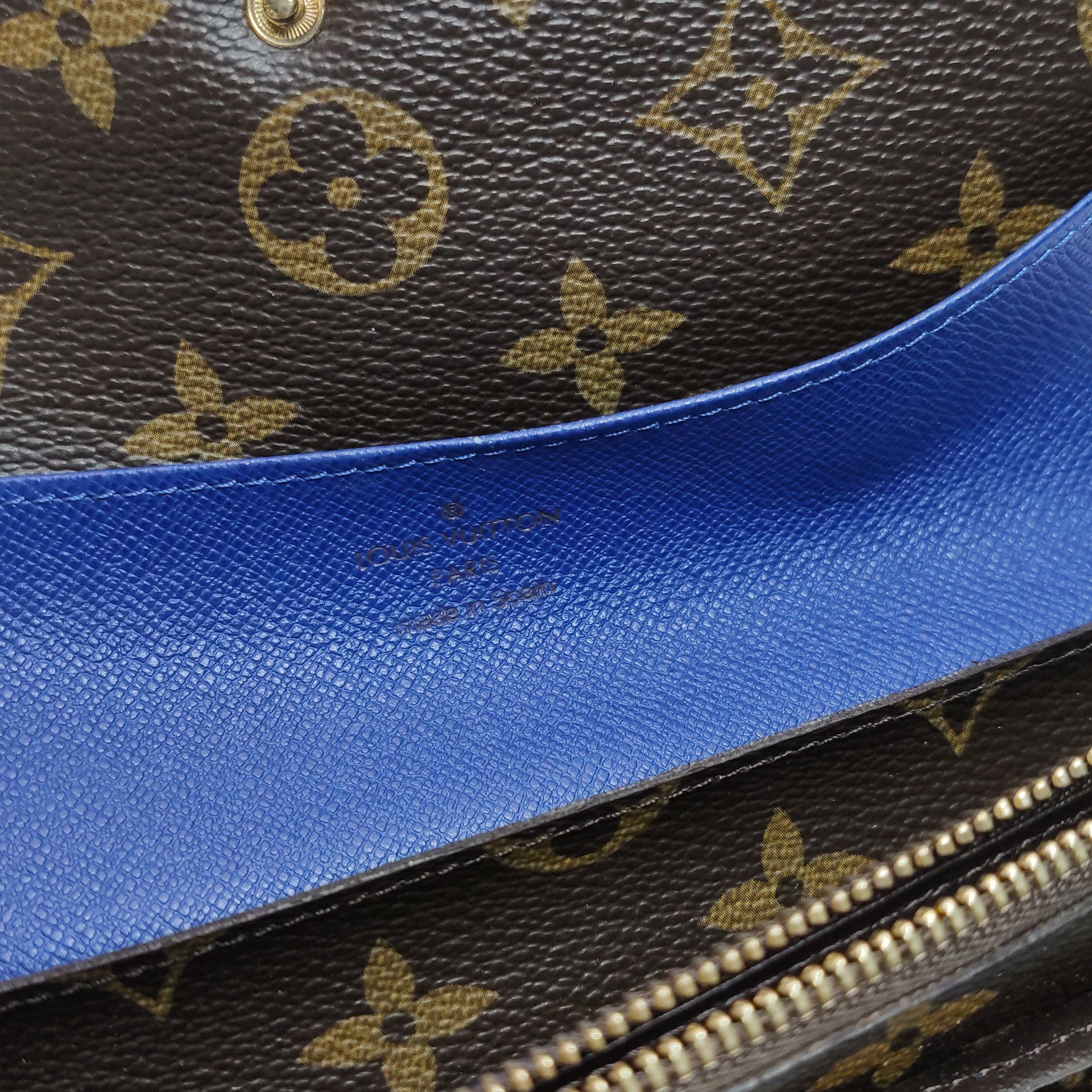 Louis Vuitton (LV) Emilie leather Monogram print snap walle