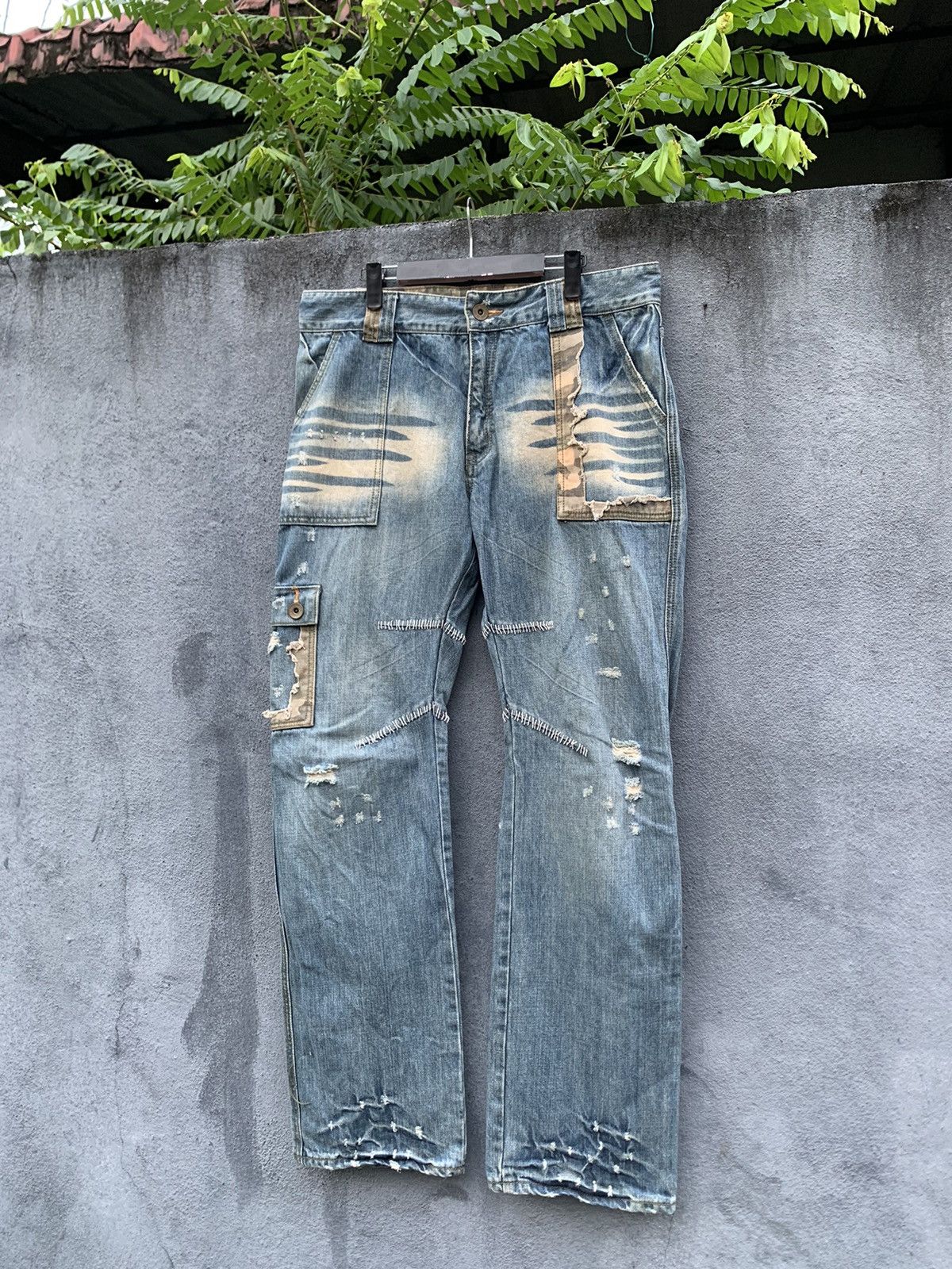 image of Vintage Four Season Distressed Baggy Jeans in Denim, Men's (Size 34)