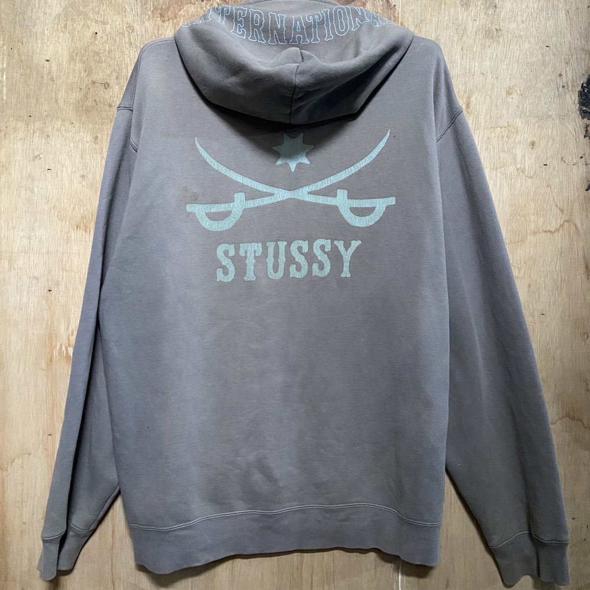 image of Faded Vintage Stussy Sword Zipper Hoodie in Faded Green, Men's (Size XL)