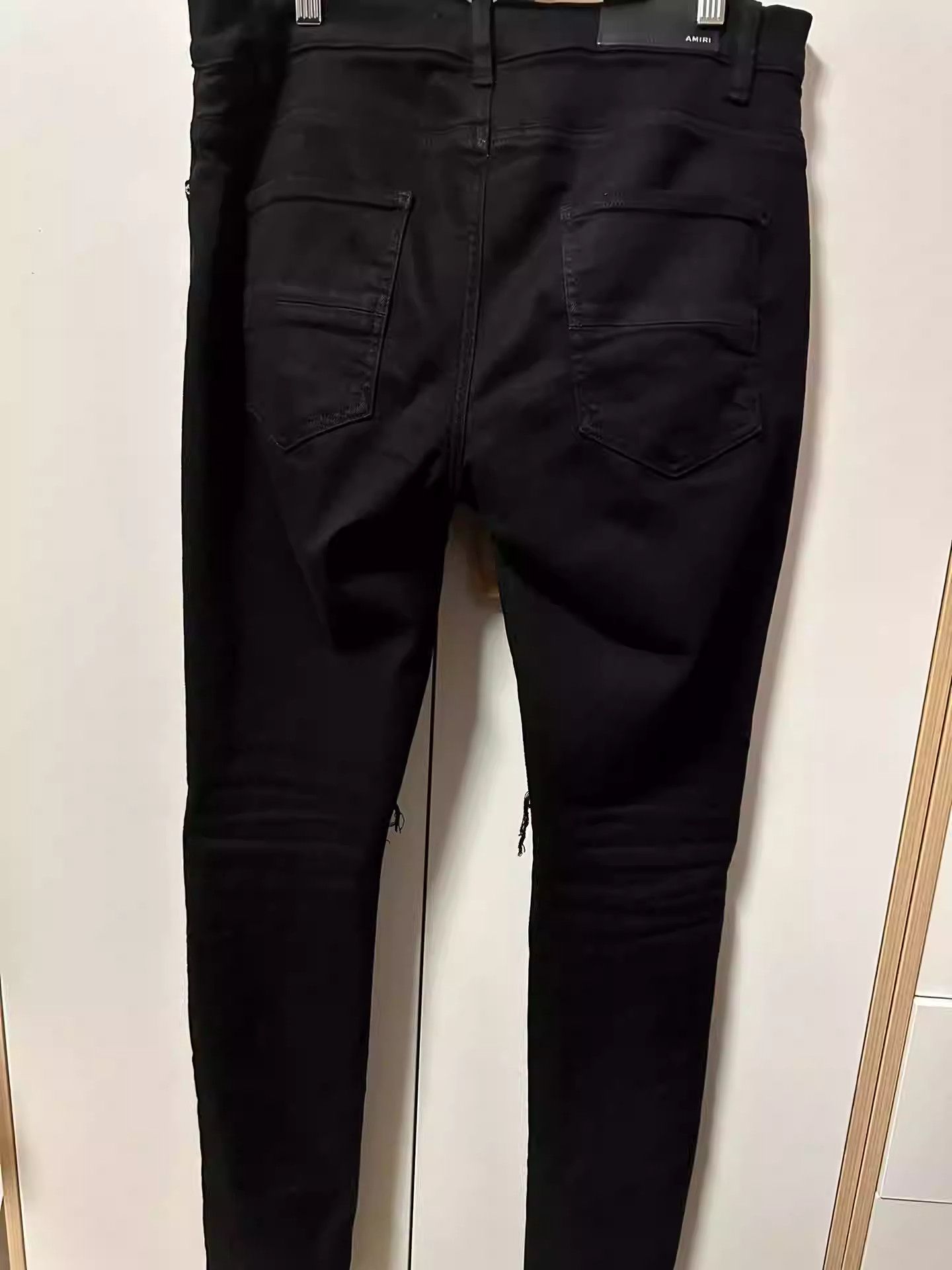 AMIRI cashew flower jeans