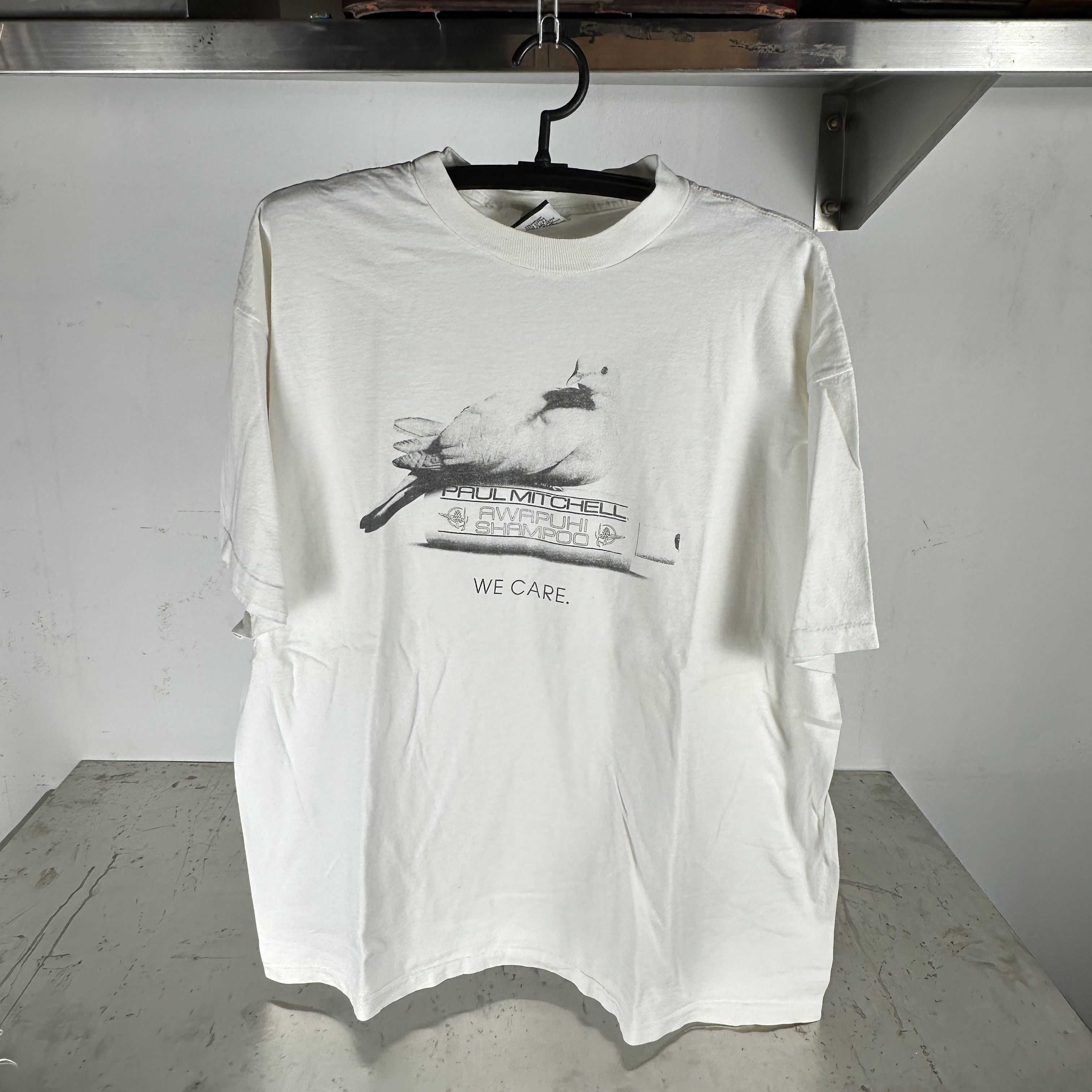 Vintage Vintage 90s Paul Mitchell We Care Hair Care Promo T-Shirt Size US XL / EU 56 / 4 - 1 Thumbnail