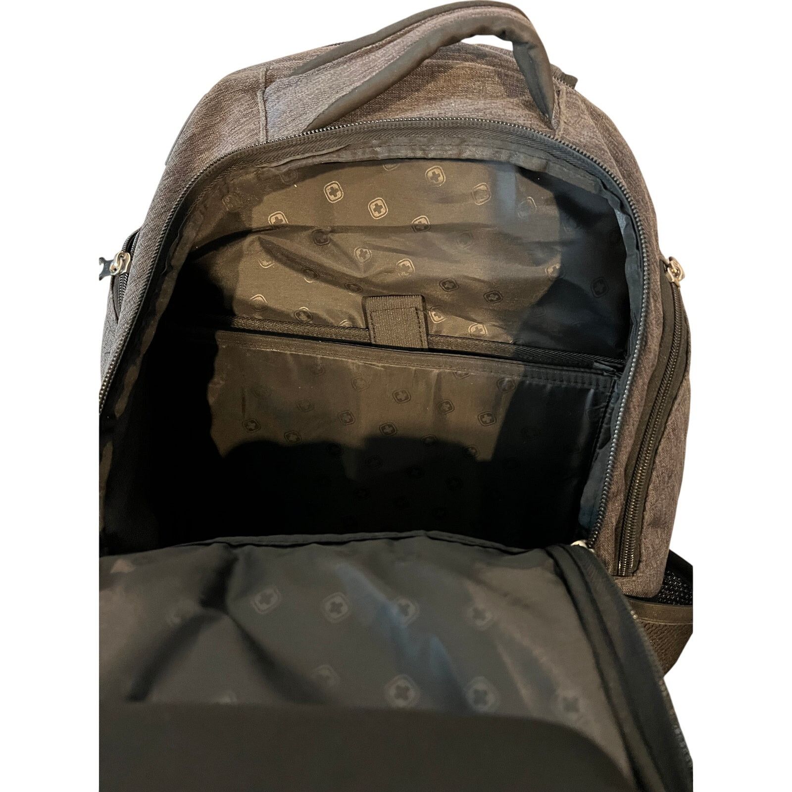 largest north face backpack The NF0A8BSH 18L Color:Black T and a sternum strap Fitz Roy Patchwork: Ink Black W&G traveler Rugged Waxed