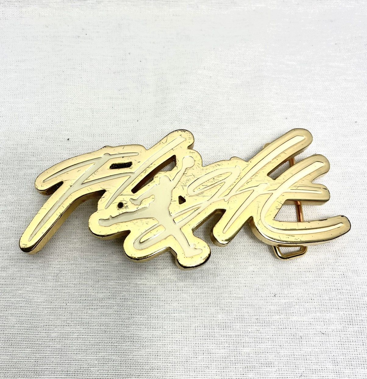 image of Nike Air Jordan Flight Belt Buckle 2006 in Gold, Men's