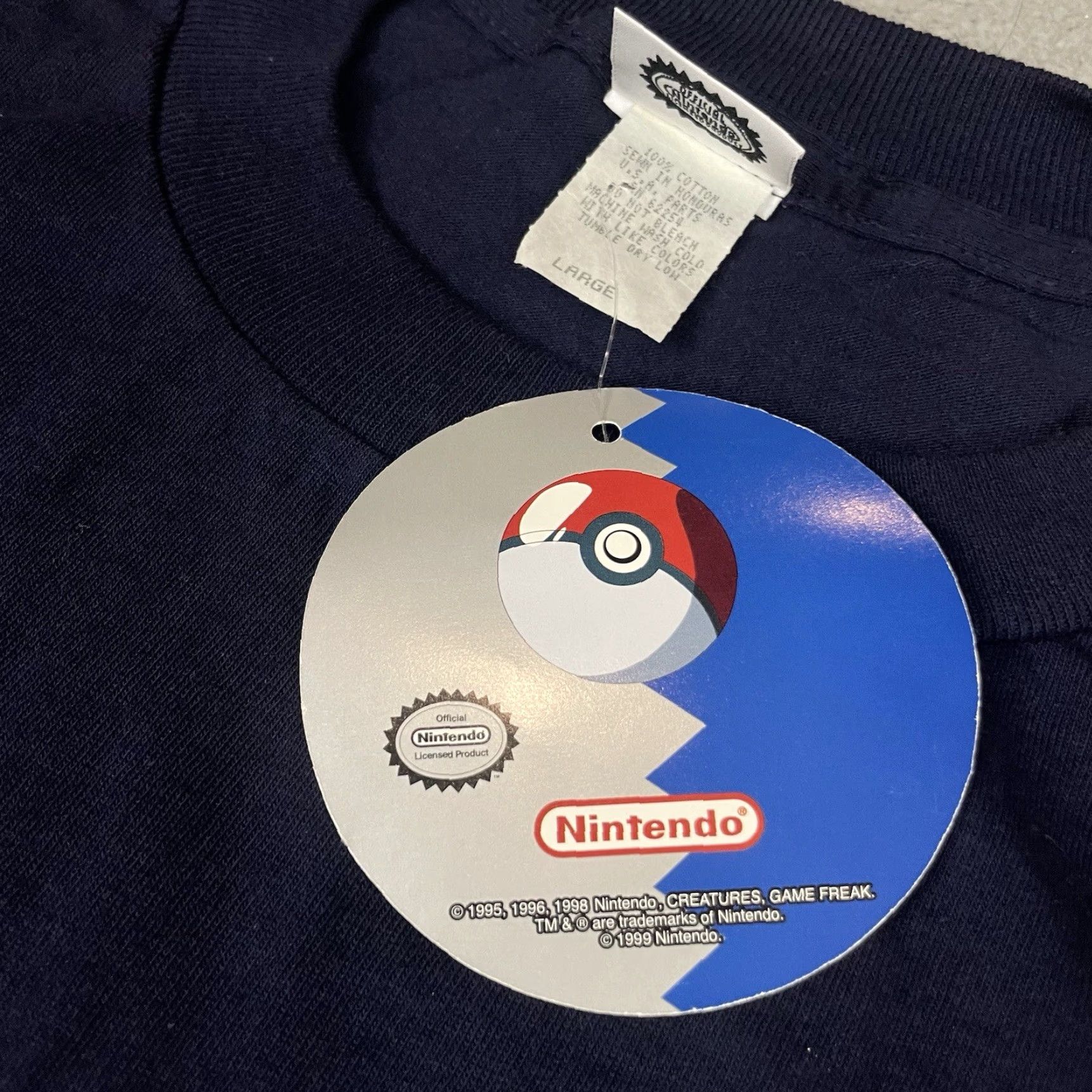 Vintage VINTAGE Pokemon T Shirt Adult L Blue Pikachu Charizard 1999 NWT Trading Card Game Size US L / EU 52-54 / 3 - 6 Thumbnail