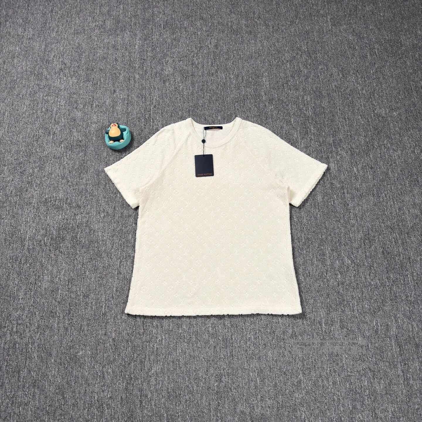 Beige Textured Short Sleeve Shirt.