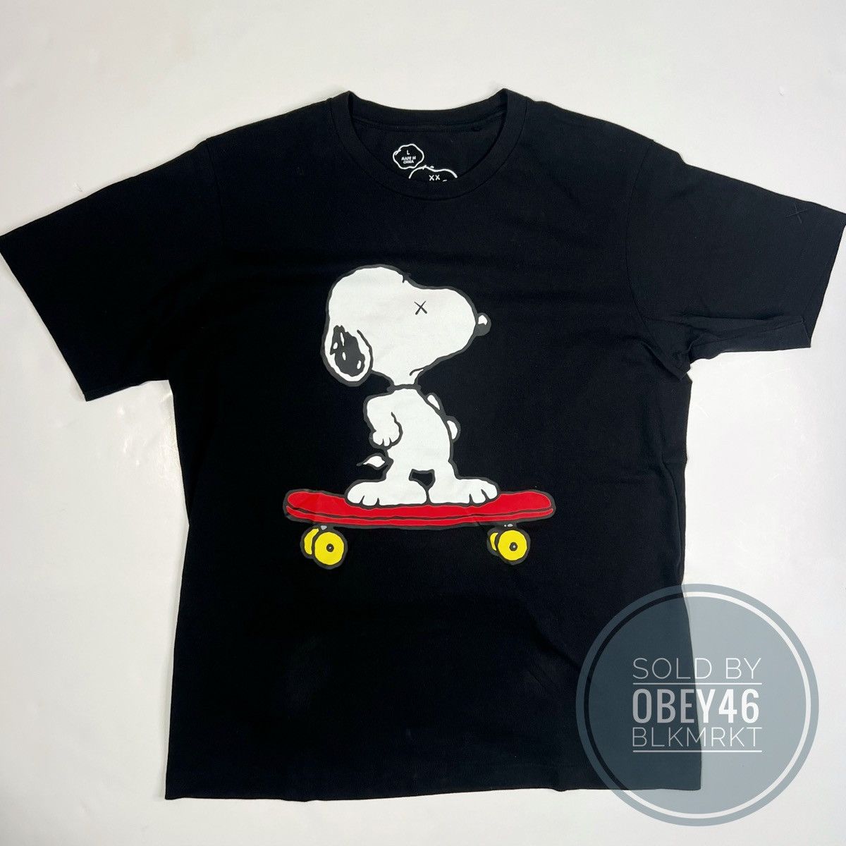 Kaws × Peanuts × Uniqlo KAWS x Uniqlo x Peanuts Snoopy Skateboarding Tee Black Size US L / EU 52-54 / 3 - 1 Thumbnail