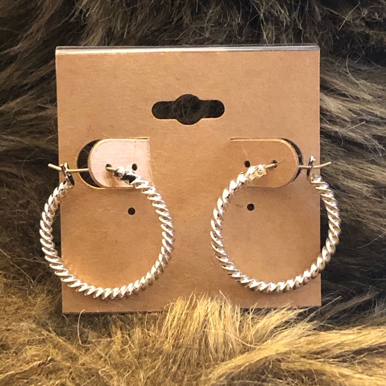 Jewelry Shiny silver plated twisted hoop earrings Size ONE SIZE - 1 Thumbnail