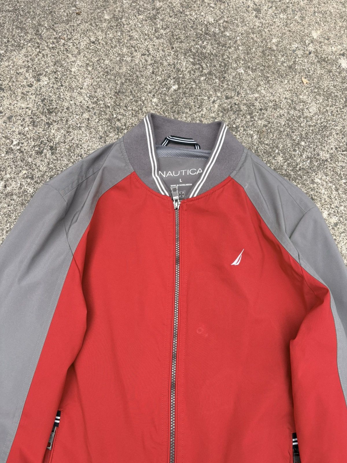 Nautica Nautica full-zip bomber in a red and grey colorblock build. Size US L / EU 52-54 / 3 - 3 Thumbnail