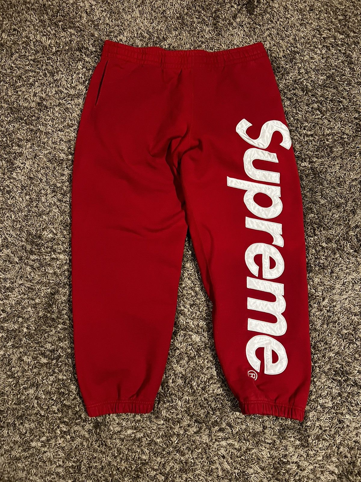 Supreme red sweatpants online