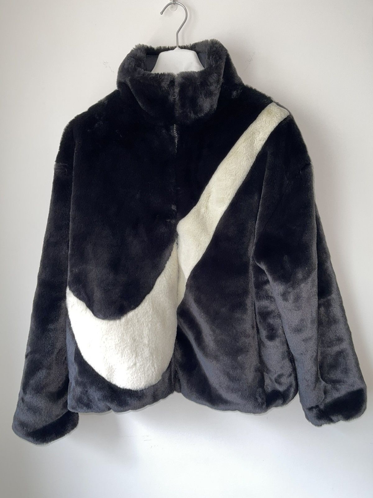 swoosh faux fur jacket