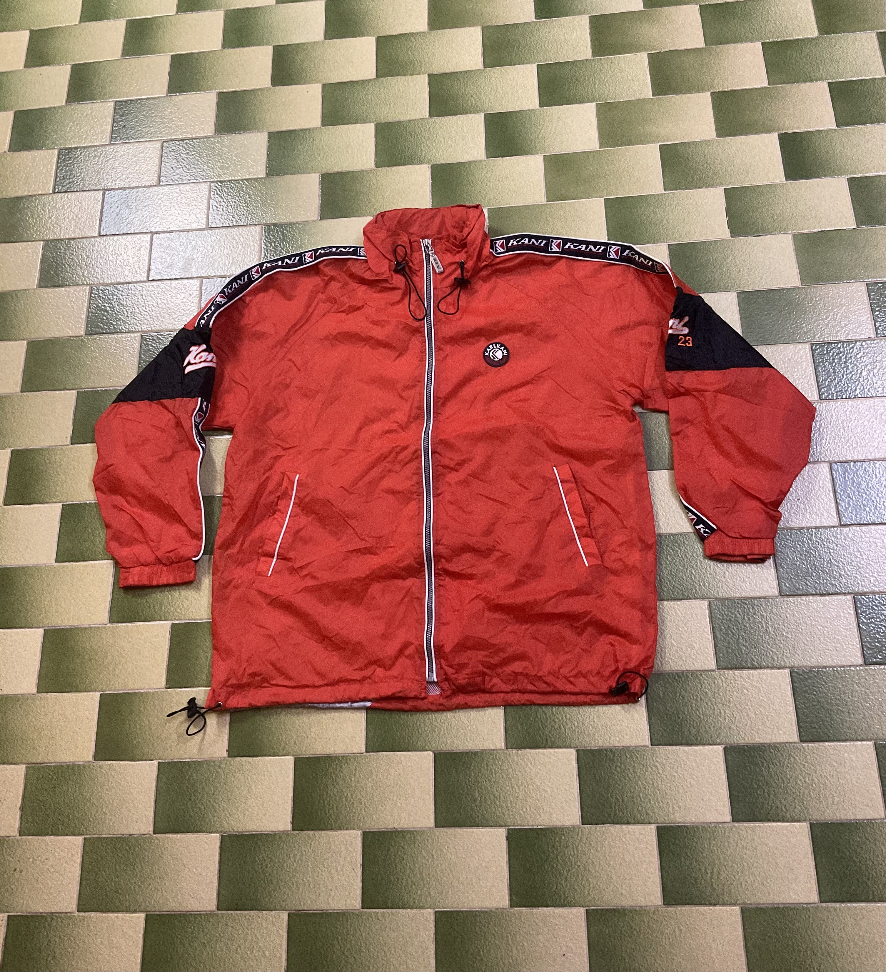 Vintage Karl Kani tapered packable hooded windbreaker jacket