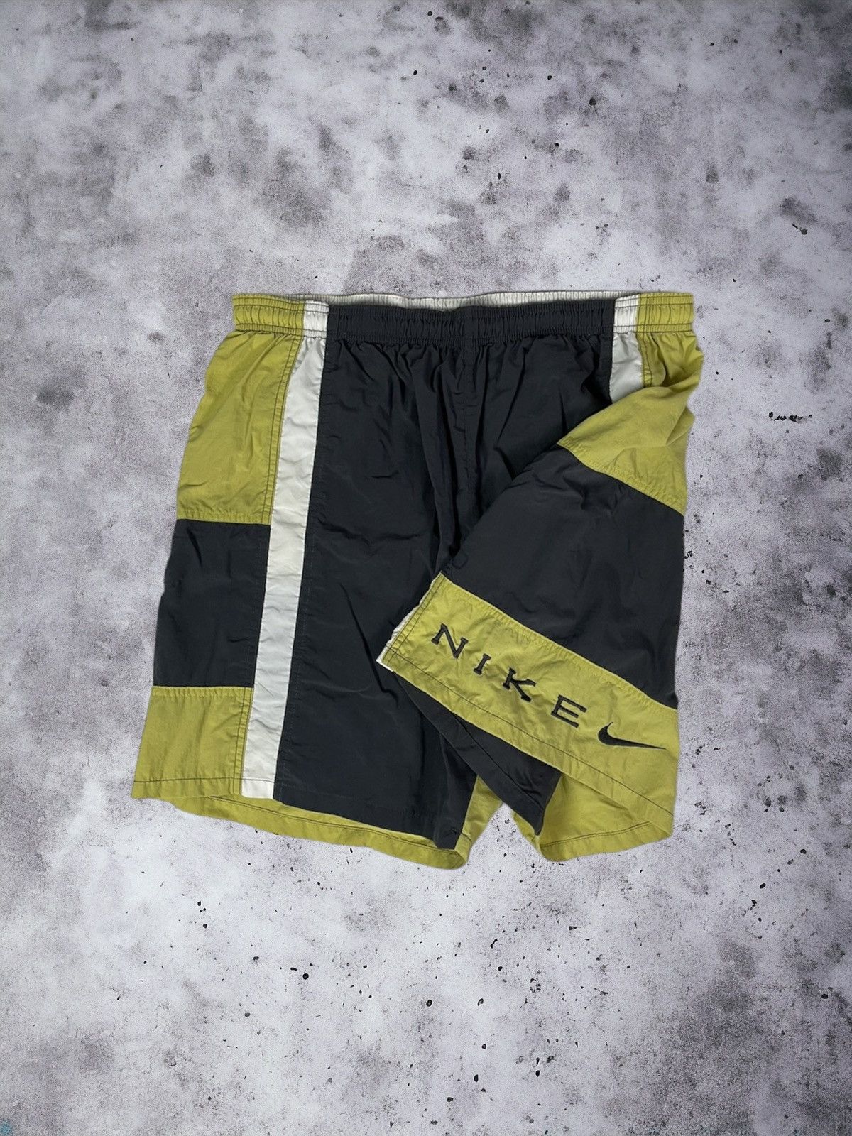 image of 90's Nike Spell Out Big Logo Nylon Shorts in Black Yellow, Men's (Size 36)