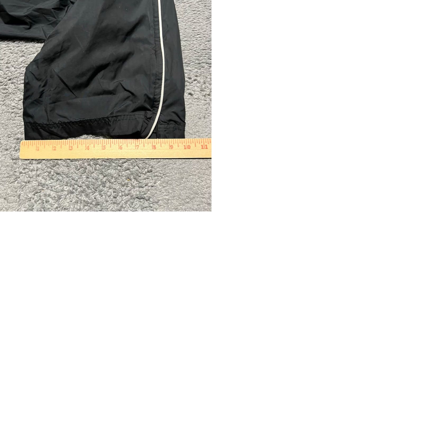 Nike VINTAGE 90s Nike Track Pants Mens XXL Black Cuffed Windbreaker Swoosh Ankle Zip Pants Mens Black 90s Nike Track Windsuit? Size 48R - 9 Thumbnail