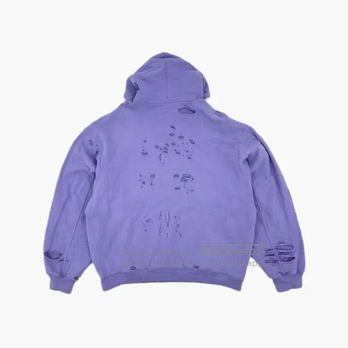 Balenciaga SS22 Purple Logo Hoodie with Distressed Details.