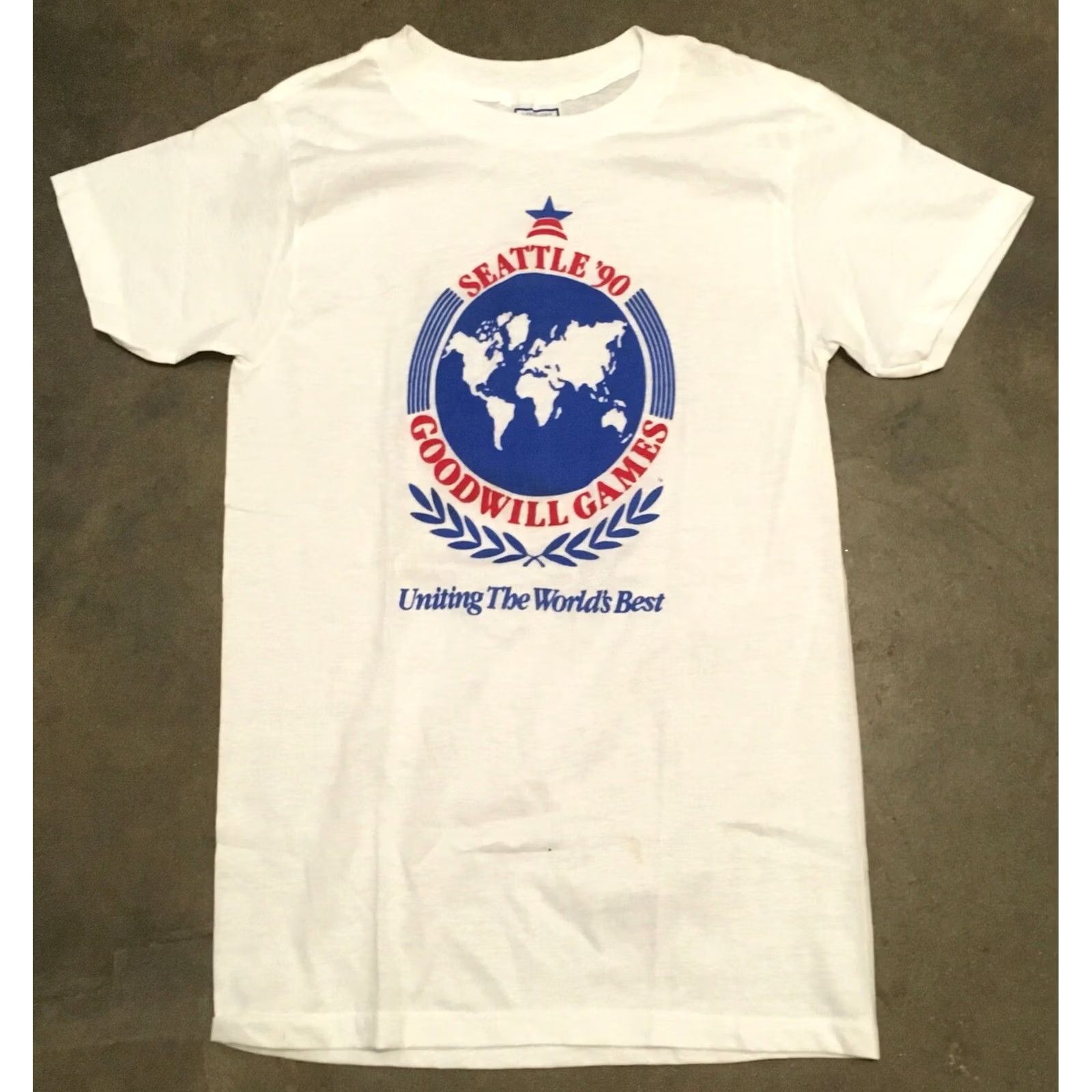 Vintage VINTAGE Seattle 90s Goodwill Games Uniting The World’s Best T-Shirt M 38-40 White Mens Short Sleeve Graphic Tee Size US M / EU 48-50 / 2 - 7 Thumbnail