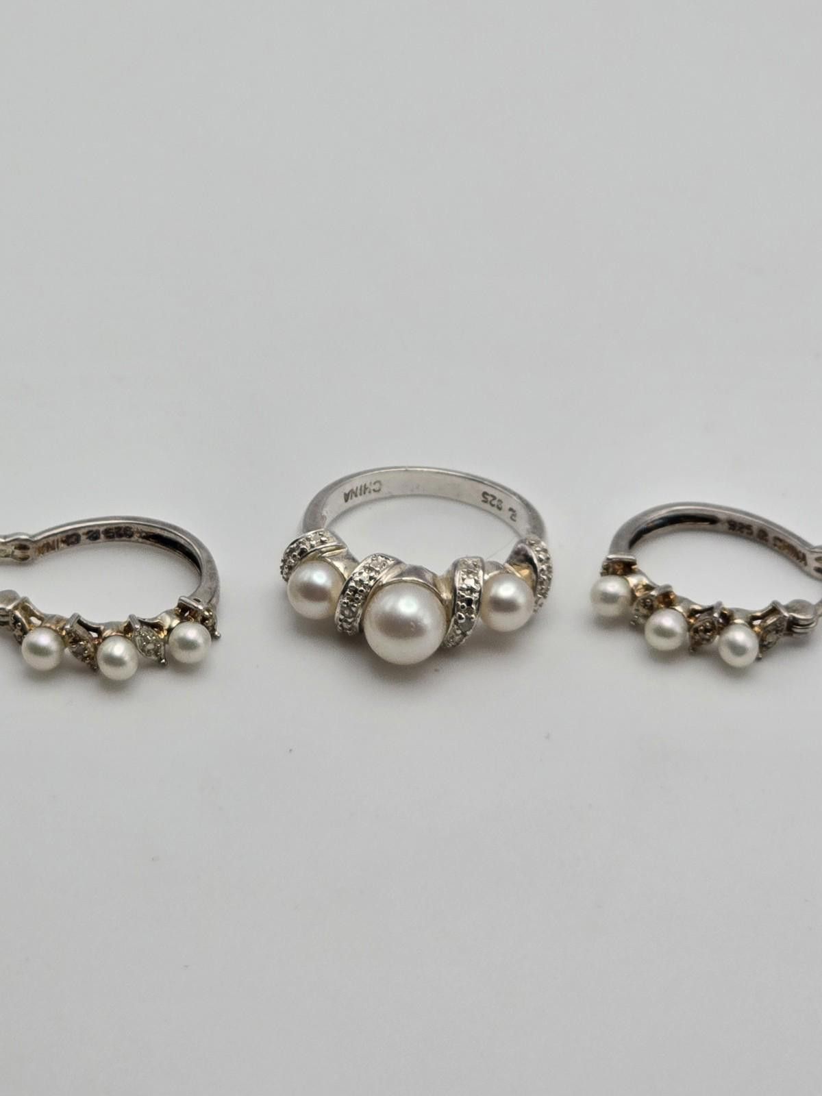 The Unbranded Brand Sterling Silver Ring Hoop Earrings Set with Real Pearls 6.75 Size ONE SIZE - 1 Thumbnail