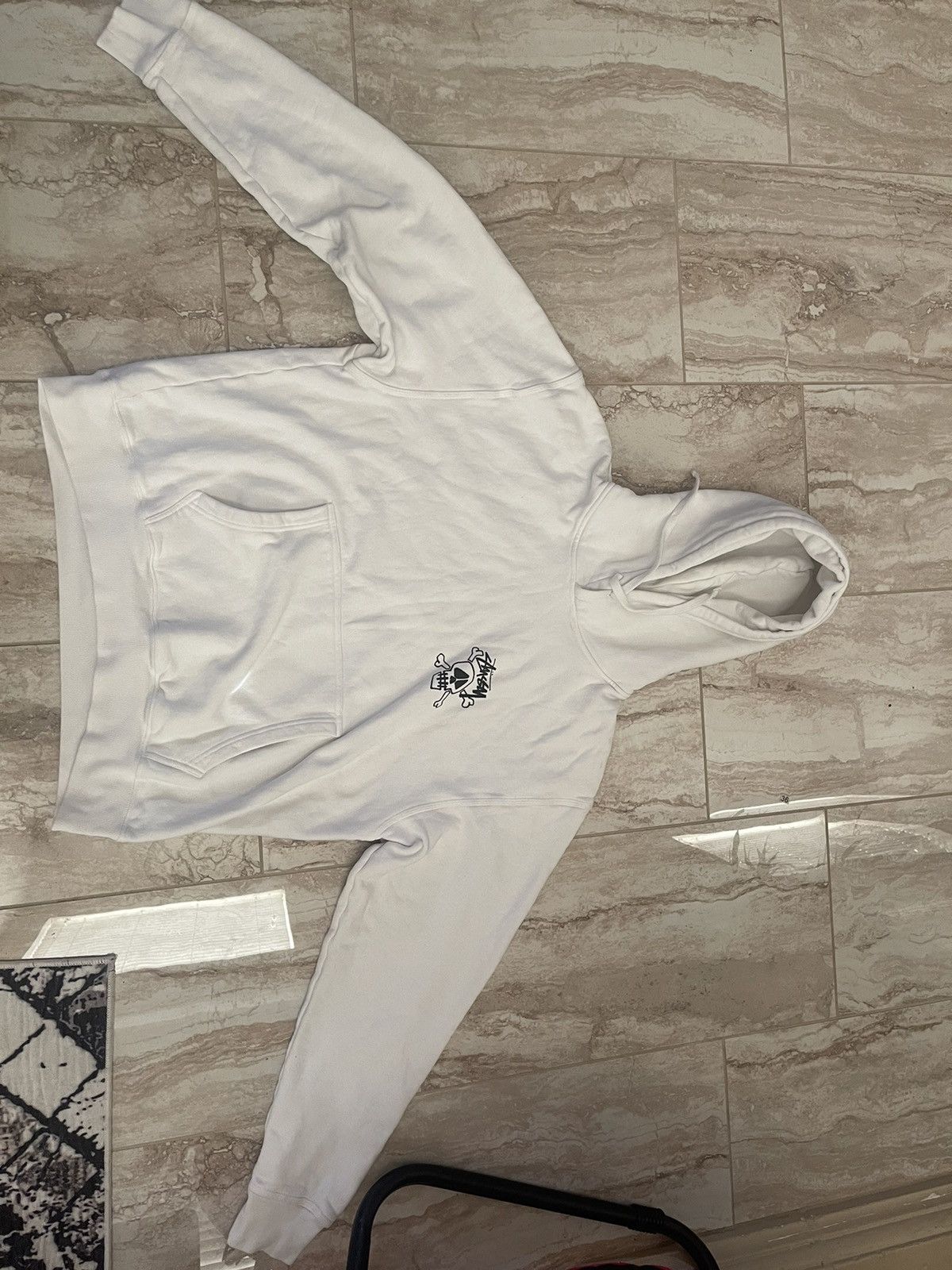 image of Stussy Skull And Bones Hoodie in White, Men's (Size XL)