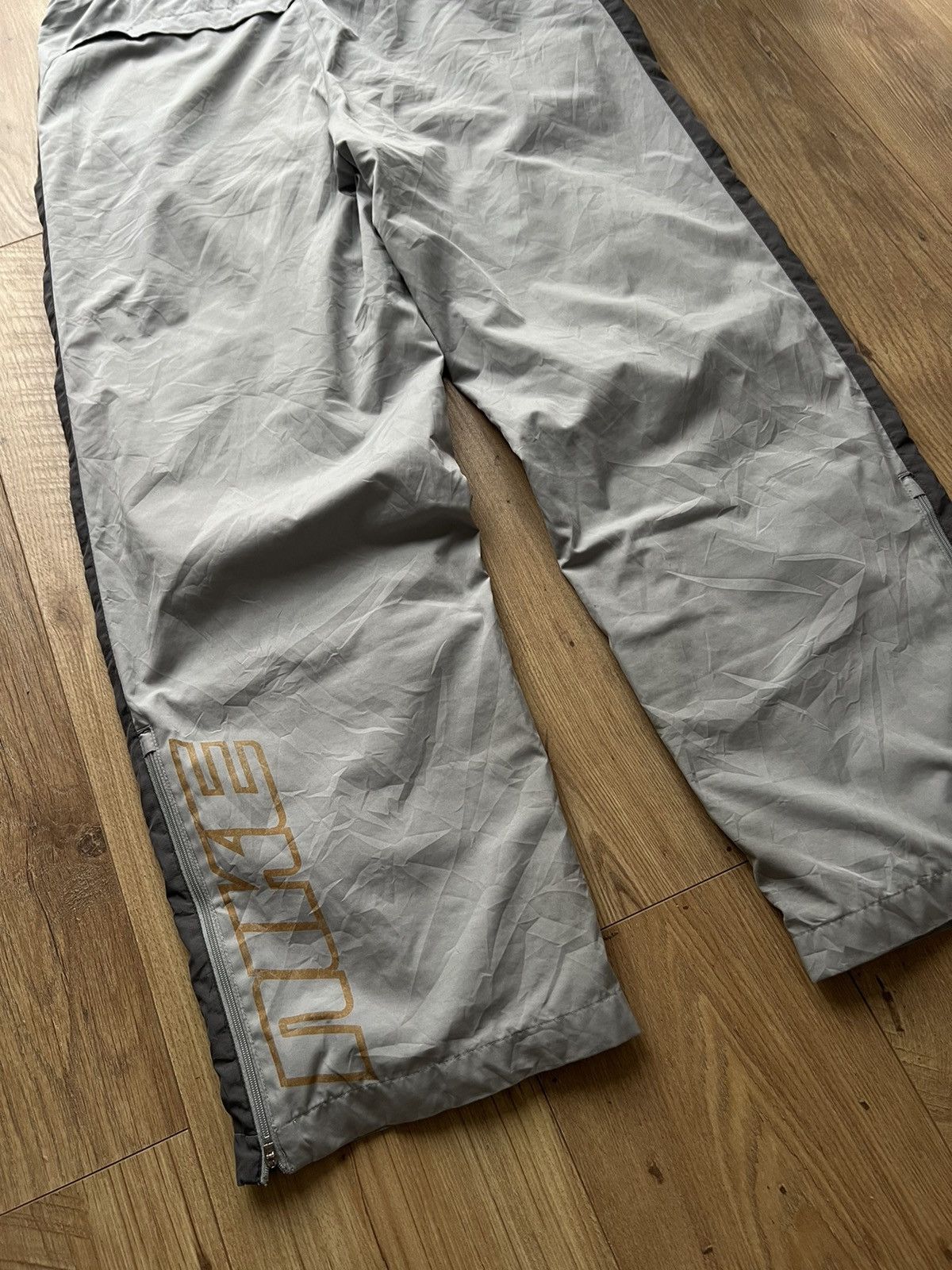 00’s NIKE BAGGY Y2K TRACK PANTS SWOOSH SPELLOUT LOGO