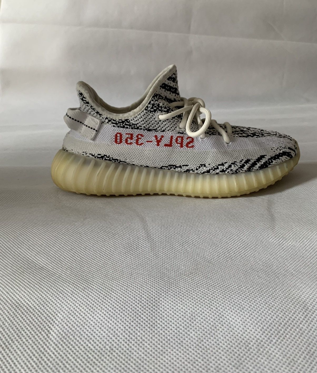 image of Yeezy Season Yeezy 350 Zebra Shoes in White, Men's (Size 7)