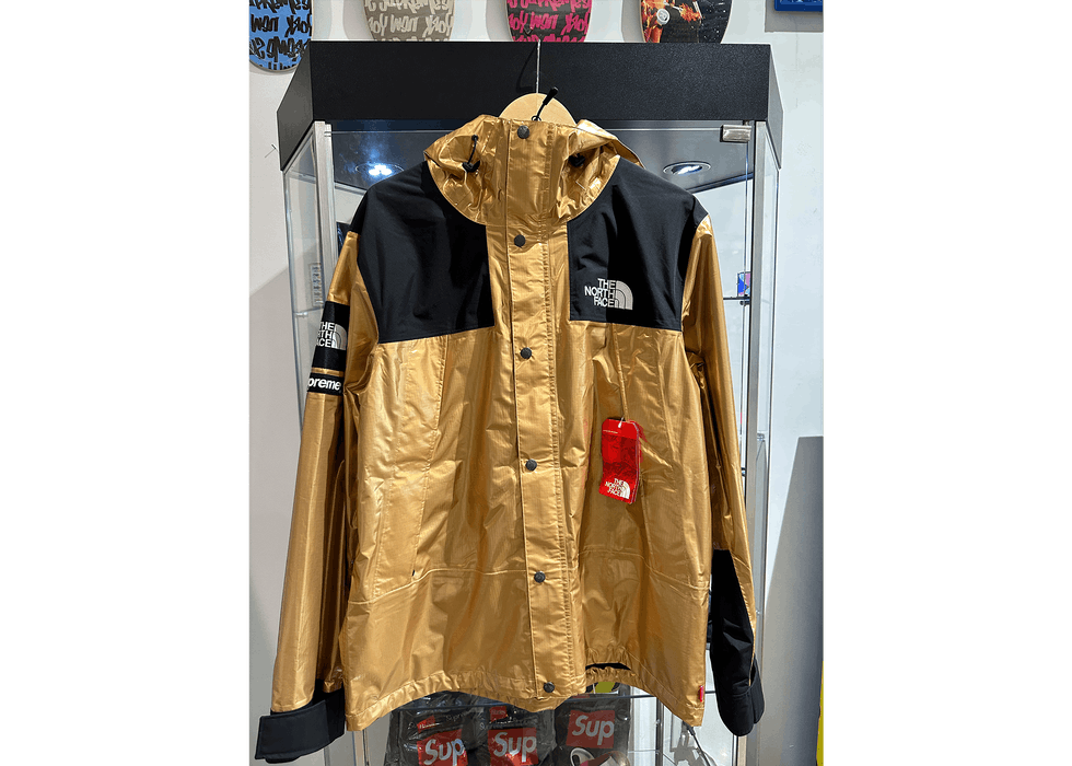 Supreme Supreme TNF Metallic Golf Mountain Parka Gold | Grailed