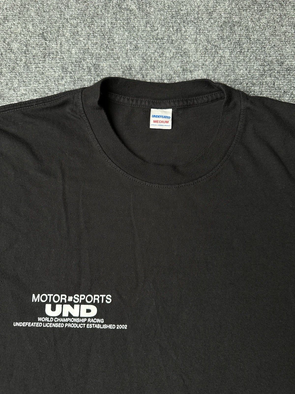 Undefeated Mens T-Shirt Undefeated Motorsports Black White USA, Size M Size US M / EU 48-50 / 2 - 4 Thumbnail