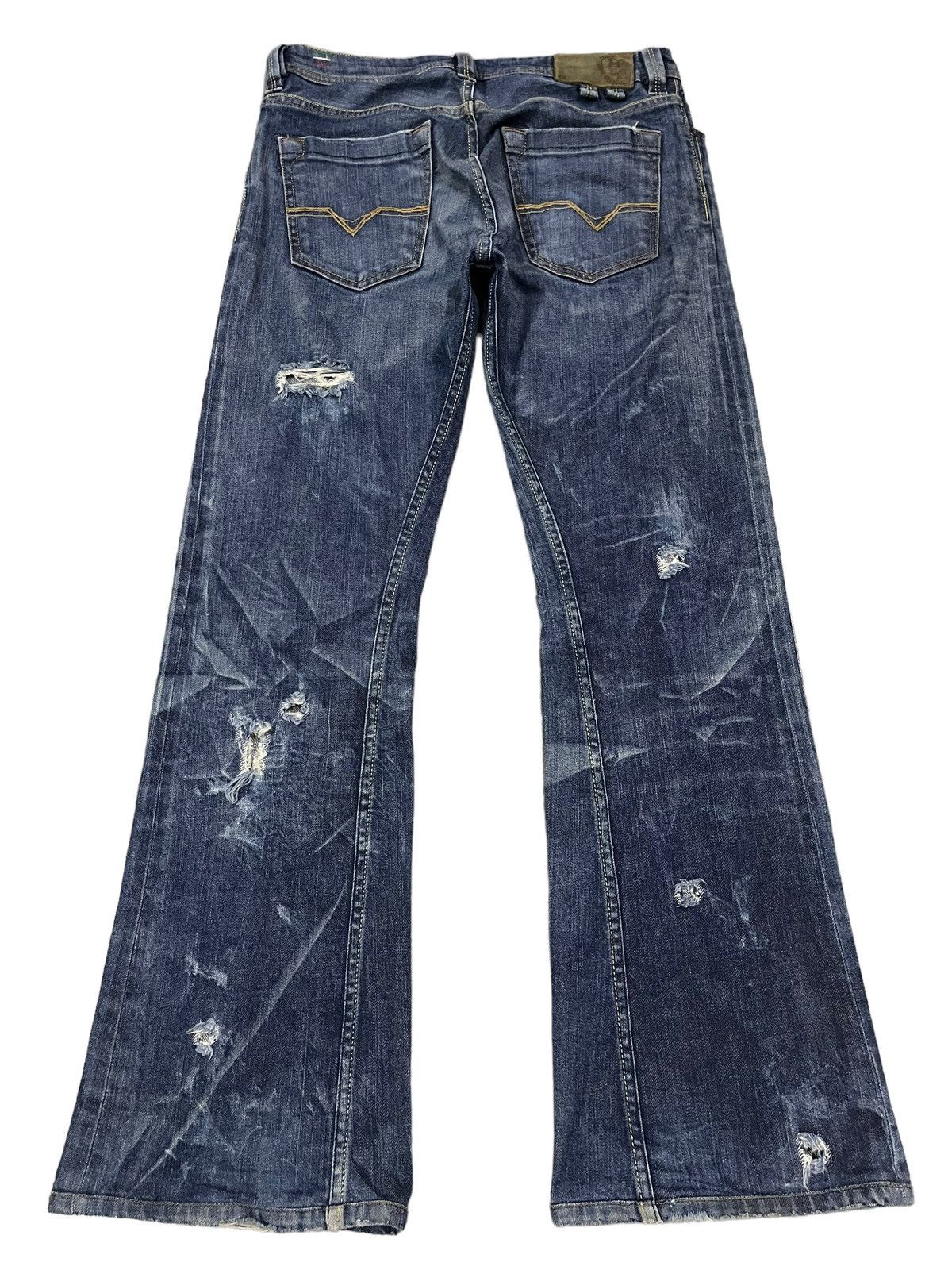 image of Vintage Diesel Industry Blue Wash Distressed Flare Jeans, Men's (Size 31)