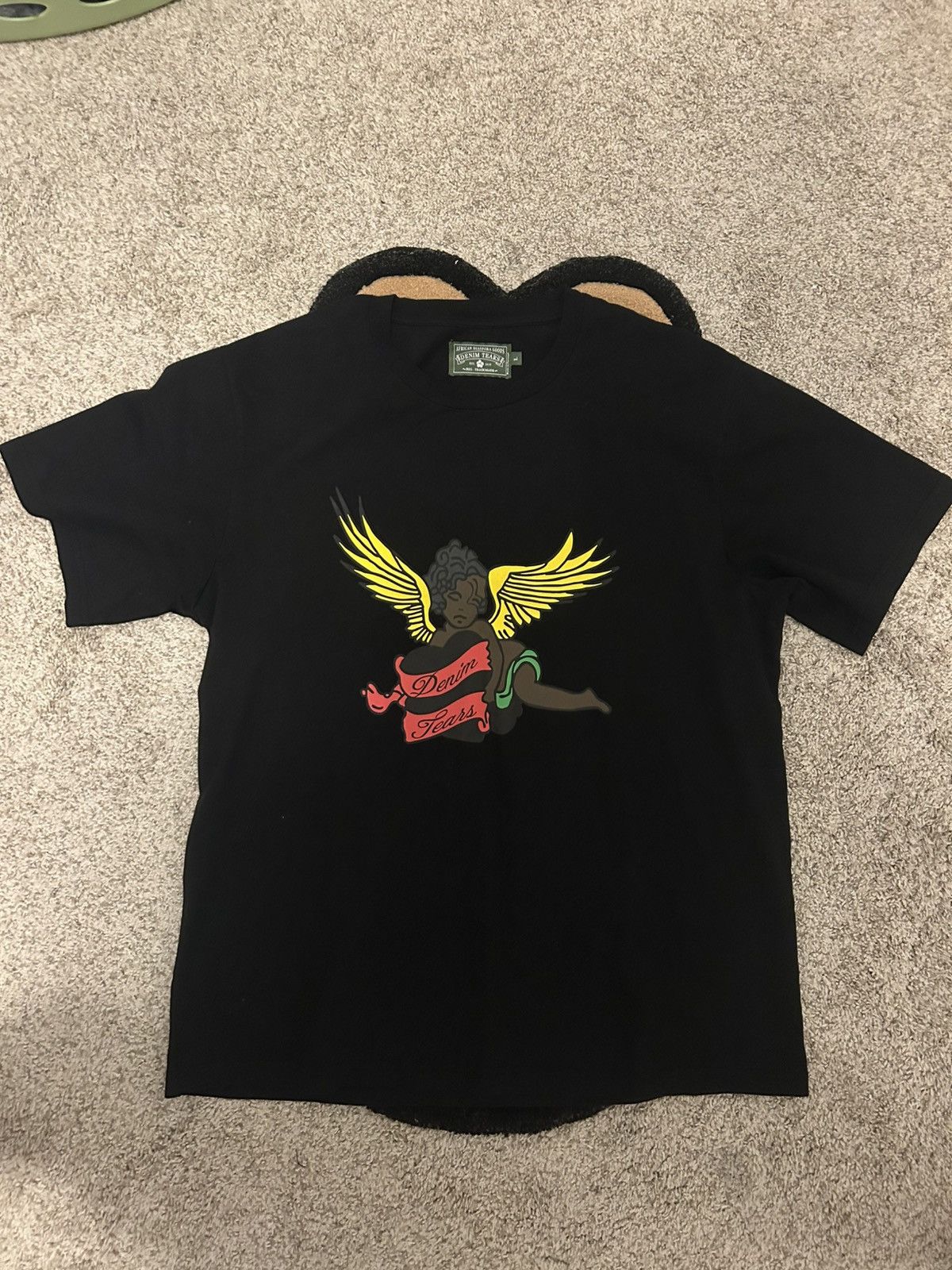 DENIM TEARS Denim Tears Black Cherub Tee | Grailed