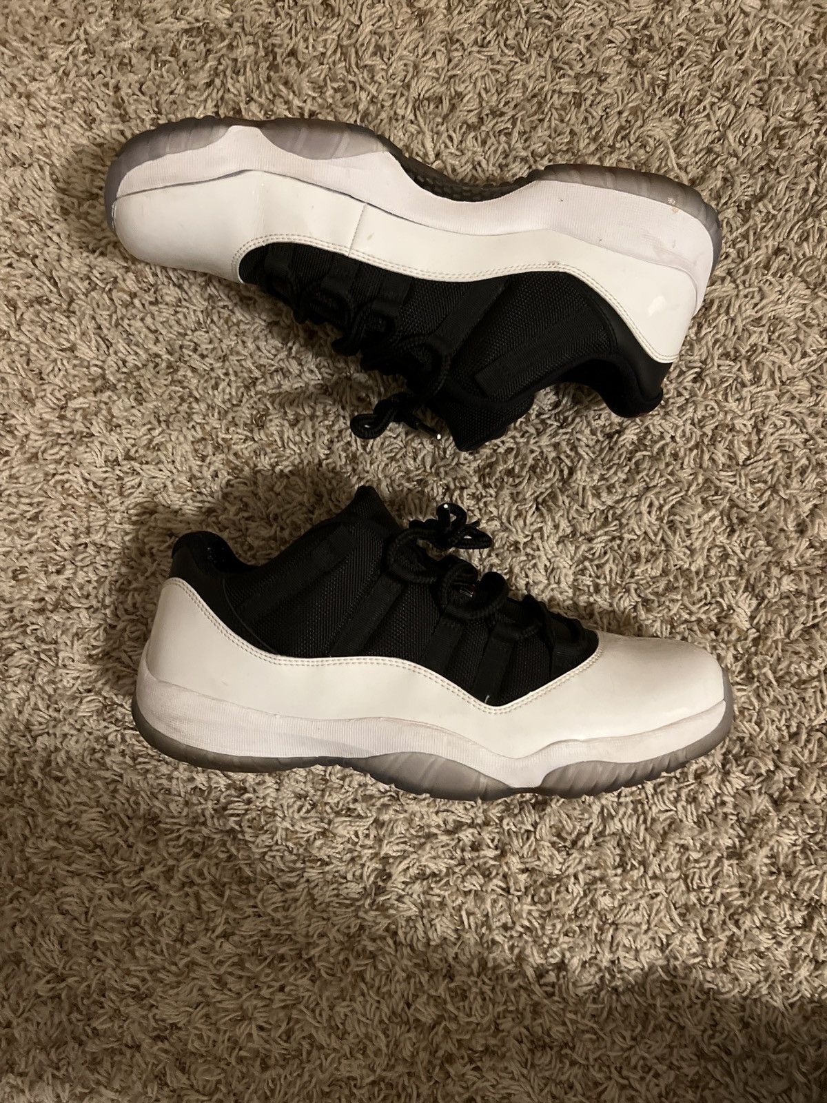image of Jordan Brand 11 Retro Low Tuxedo/ Reverse Concord Shoes in Black, Men's