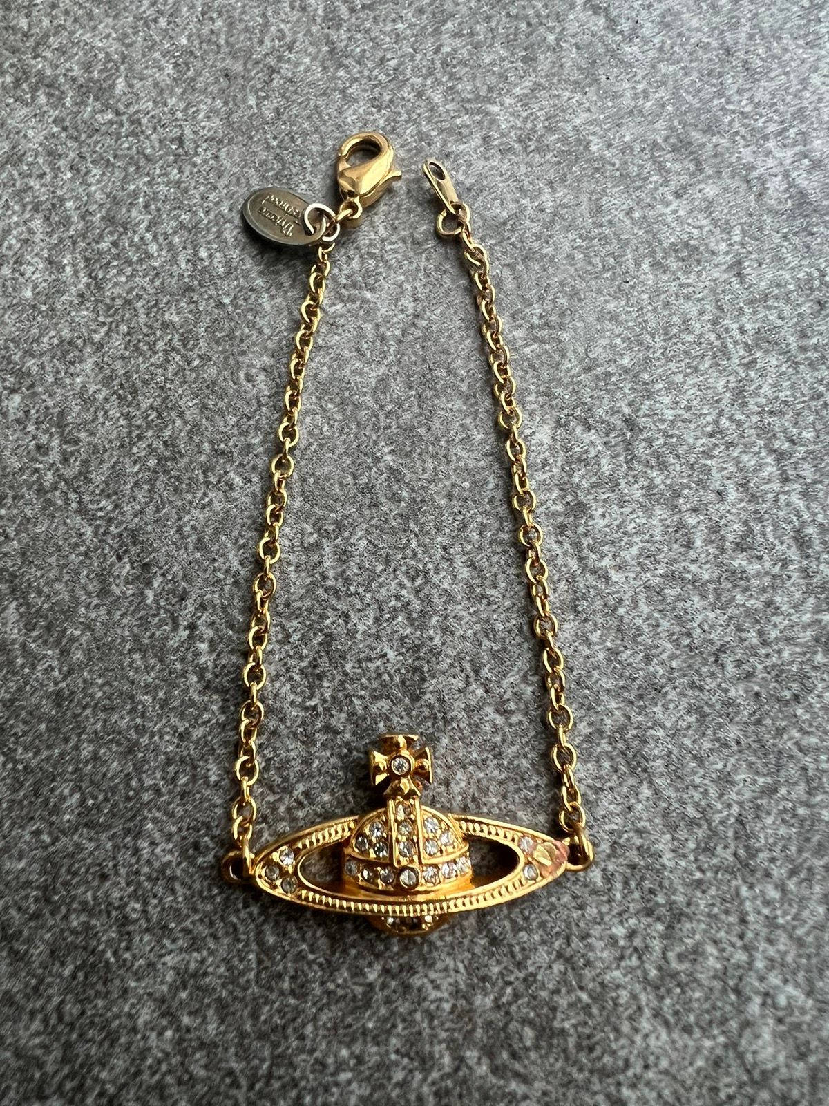 Pre-owned Vivienne Westwood Saturn Orb Bracelet In Gold