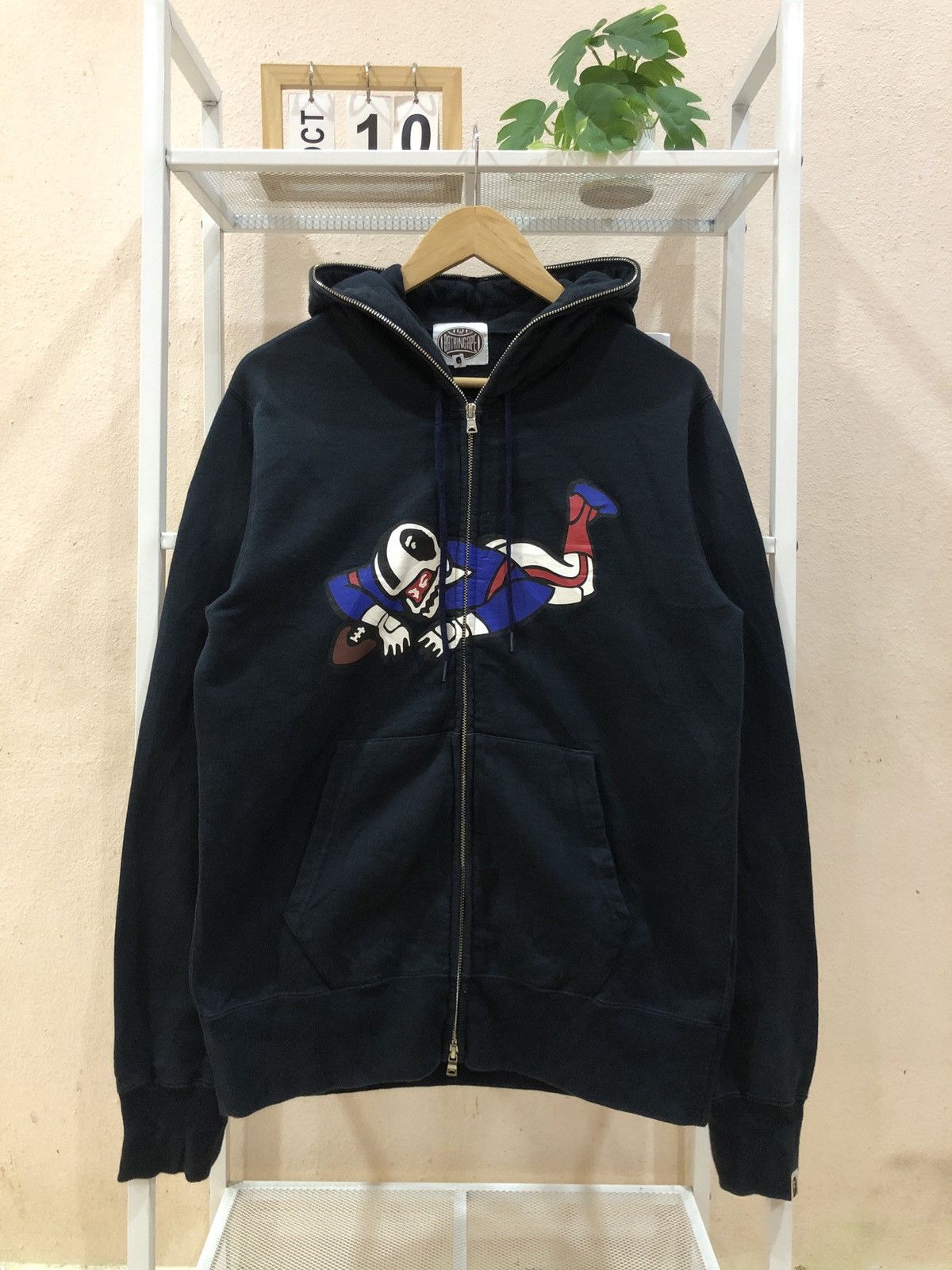 BAPE x Mitchell & Ness NFL full-zip hoodie.