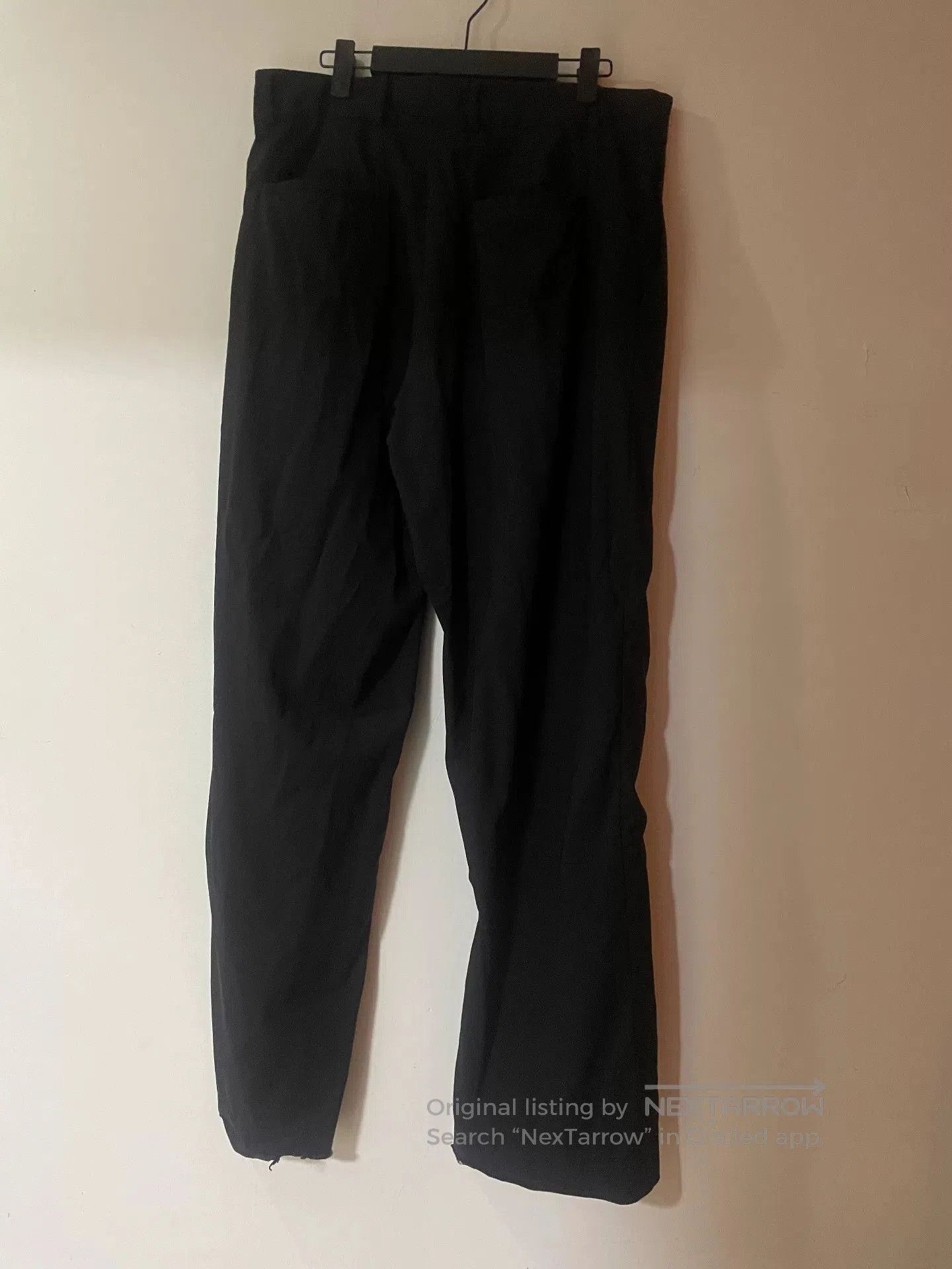 black wool straight-leg trousers size 48.