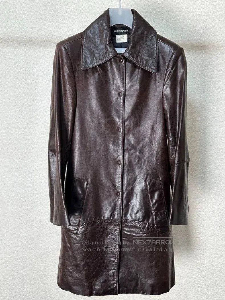 Ann demeulemeester's blood clots outside the black and red