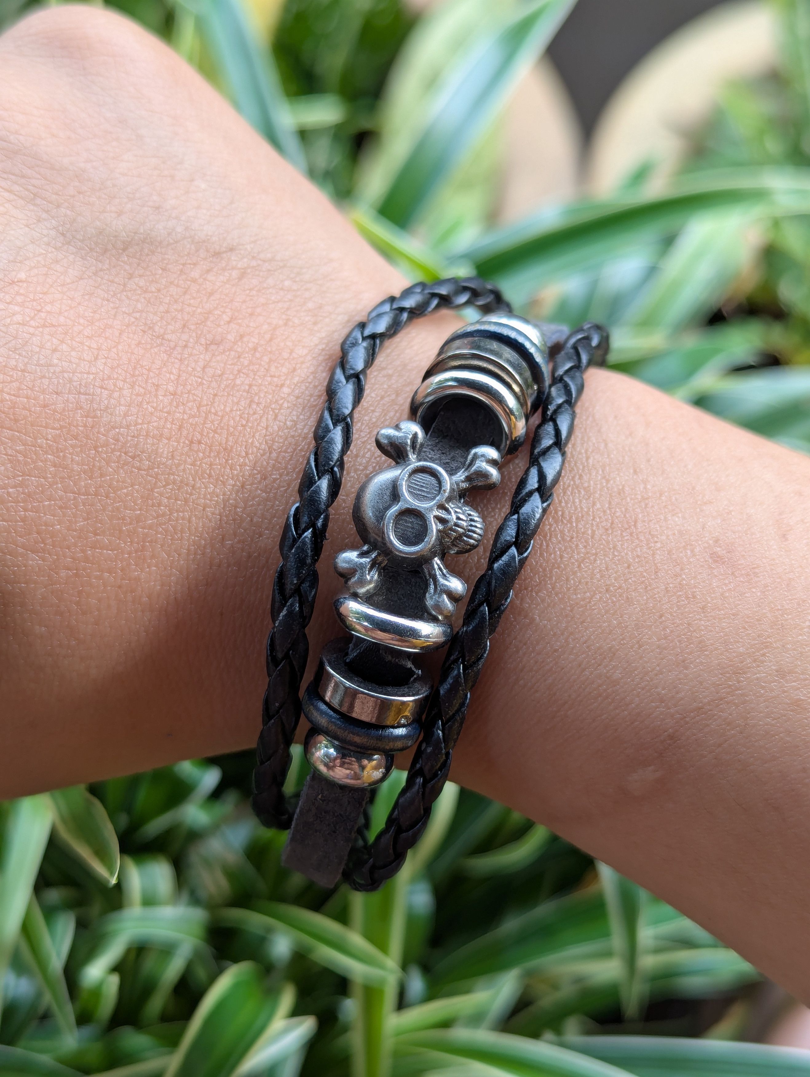 Seditionaries Braided Leather Bracelet with a Skull and Crossbones Charm Size ONE SIZE - 1 Thumbnail
