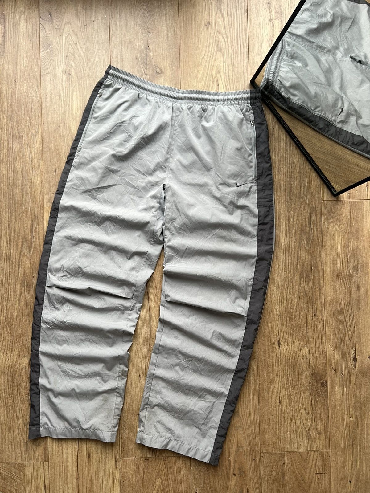 00’s NIKE BAGGY Y2K TRACK PANTS SWOOSH SPELLOUT LOGO
