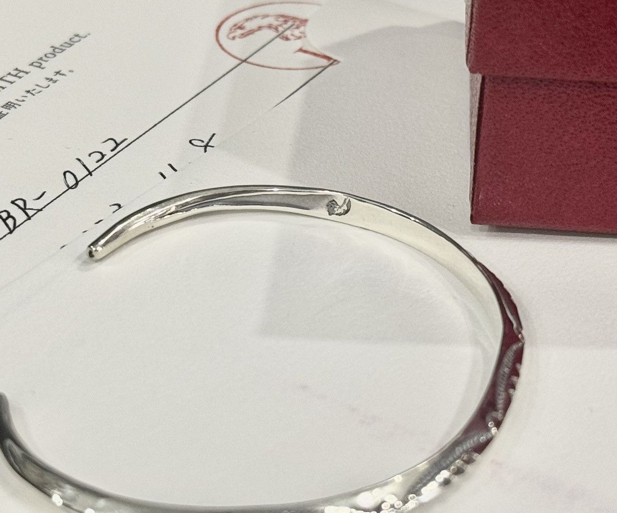 Larry Smith triangle bracelet