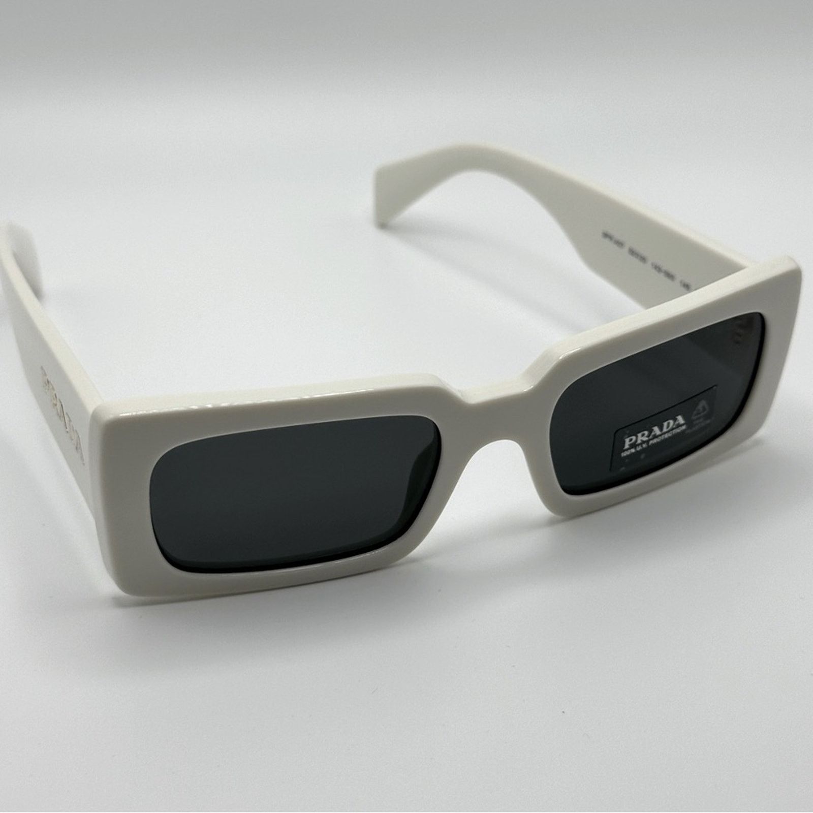 Prada NEW PRADA PRA07S 1425S0 Talc/Dark Grey Women Sunglasses Size ONE SIZE - 1 Thumbnail