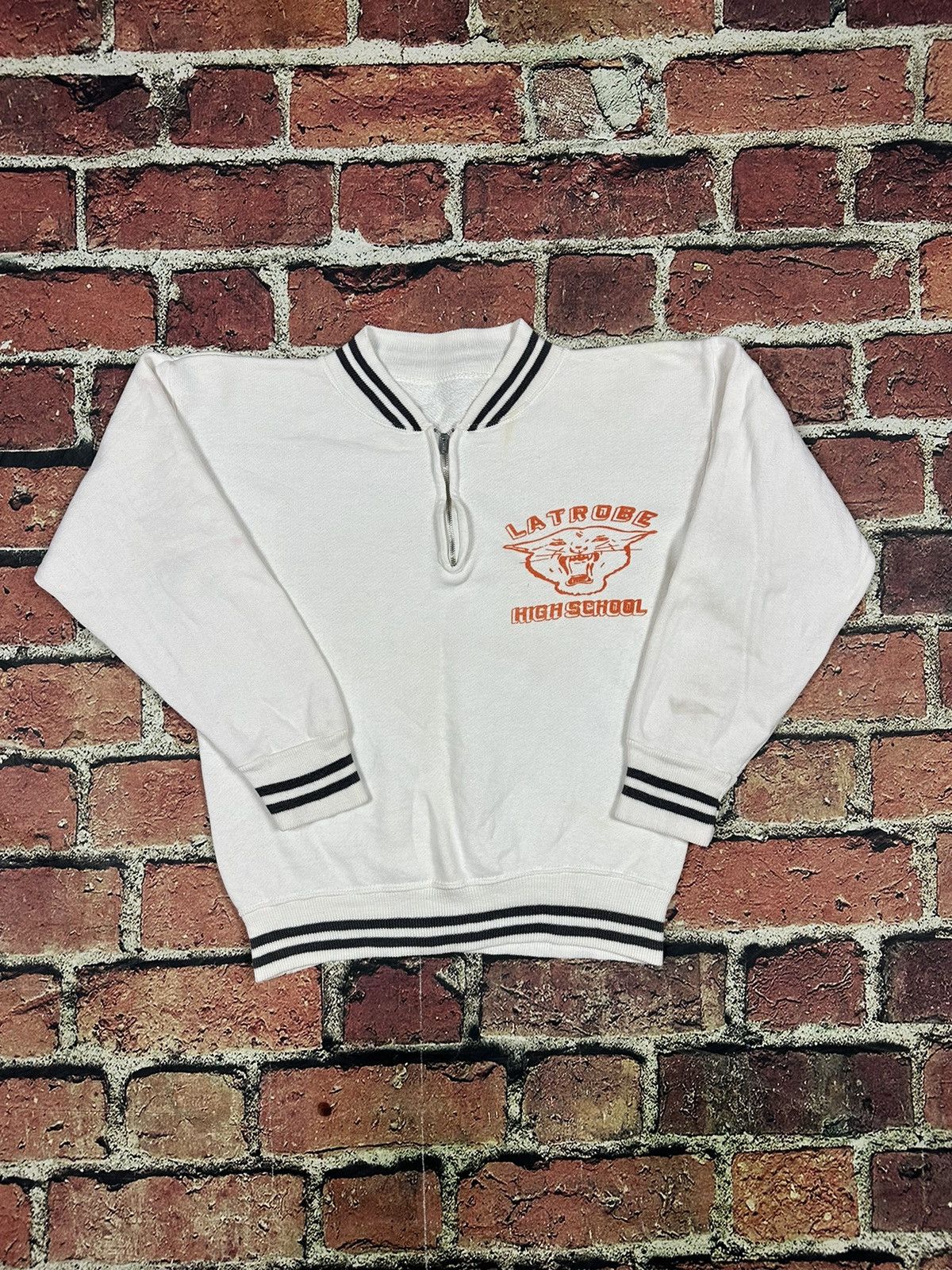 image of Champion x Made In USA Vintage Latrobe Wildcats Flock Print 1/4 Zip Sweatshirt in White (Size Small