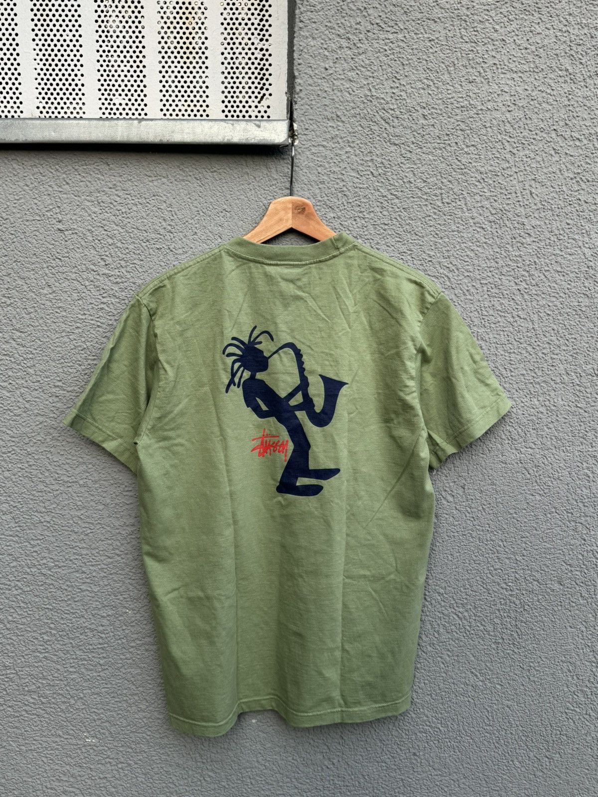 image of 80's Stussy Outdoor T-Shirt Jazz Man in Green, Men's (Size Medium)