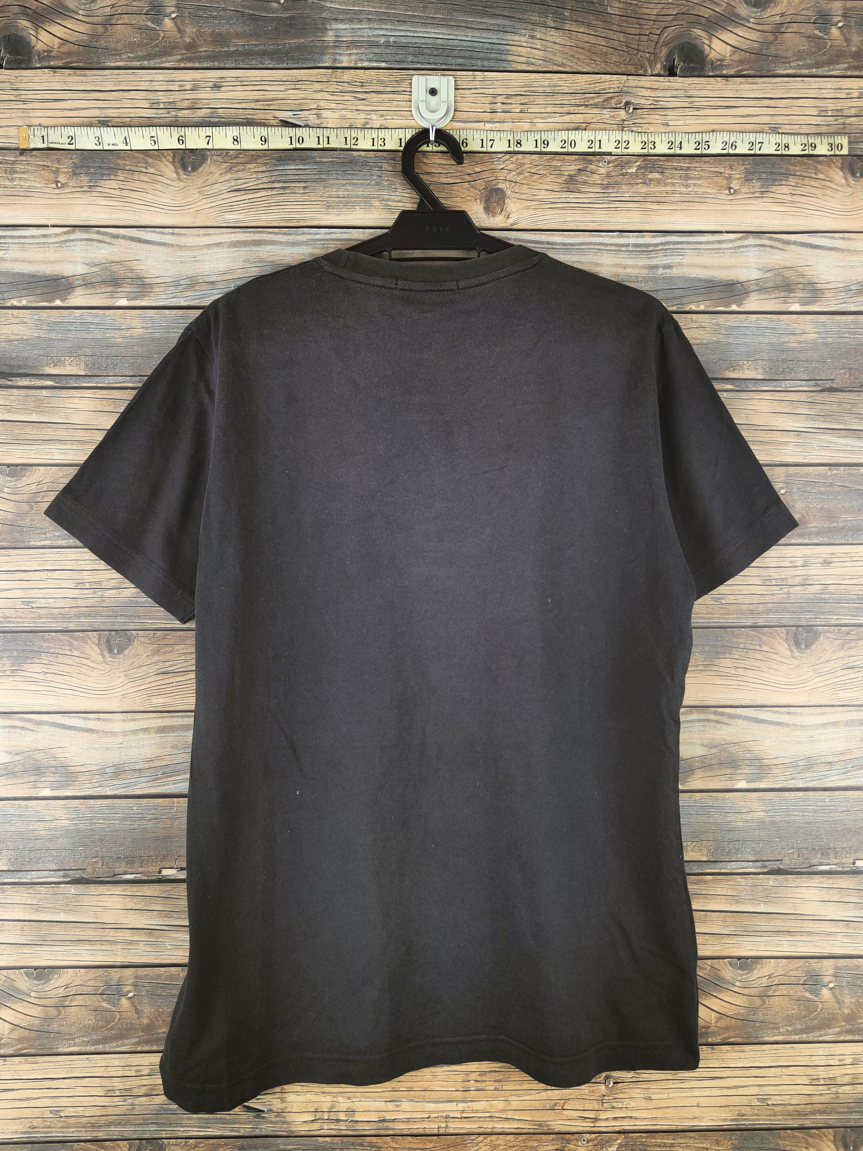 One Piece Uniqlo Black One Piece Short Sleeve T-shirts #S2865 Size US M / EU 48-50 / 2 - 9 Thumbnail