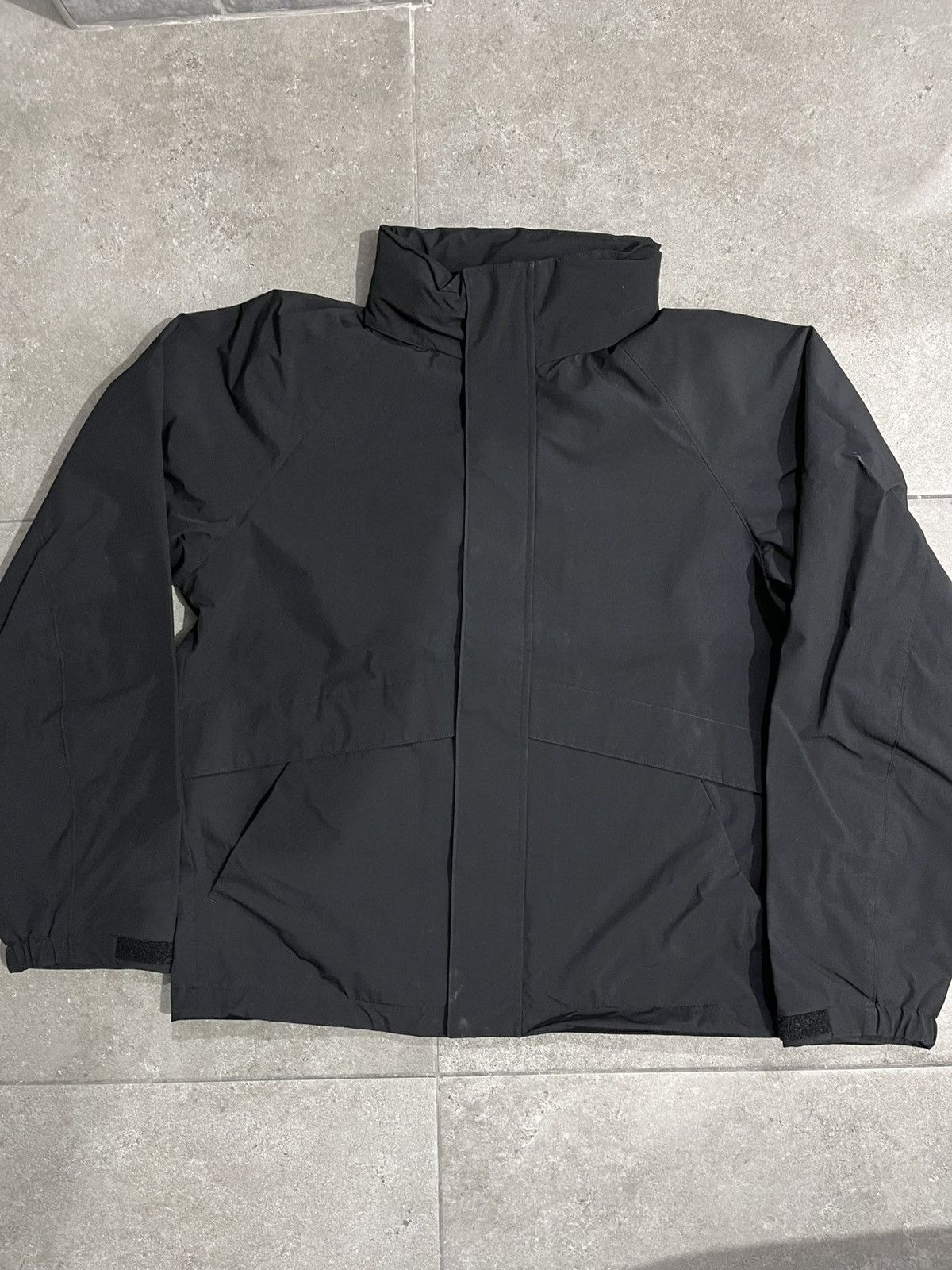 Uniqlo Uniqlo windproof stand blouson - black (XS) | Grailed
