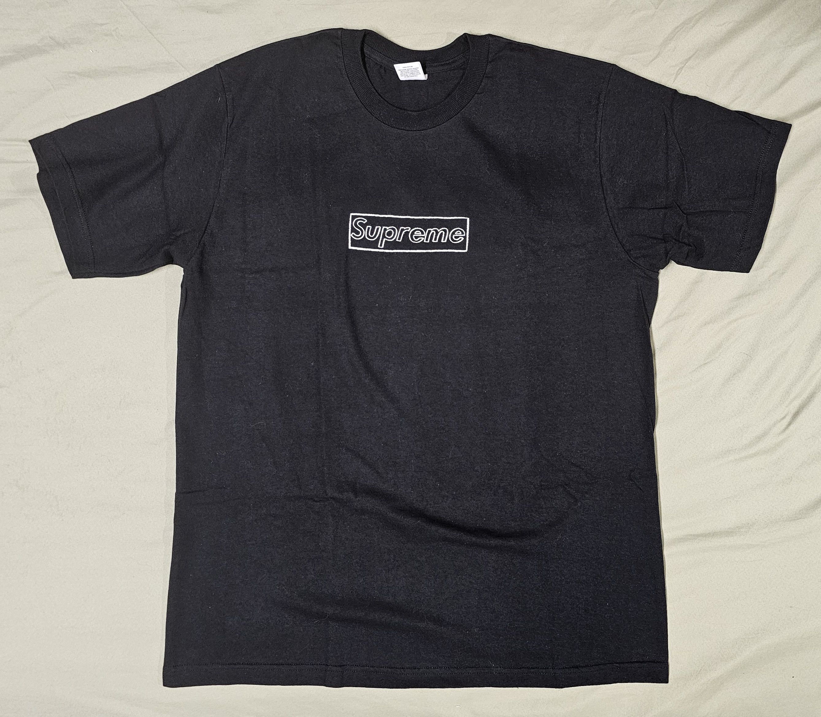 image of Kaws Chalk Logo Tee in Black, Men's (Size Large)