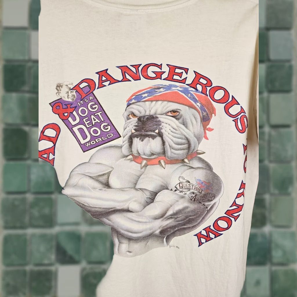 Vintage VINTAGE MAD BAD & DANGEROUS TO KNOW DOG EAT DOG WORLD COTTON T-SHIRT SZ XL Shirt Mens Cotton White 90s Logo 23 INCH 27 INCH Size US L / EU 52-54 / 3 - 1 Thumbnail